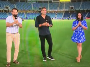 Former cricketers Irfan Pathan (L) and Wasim Akram gesture to somebody along with anchor Mayanti Langer after India beat Pakistan at Asia Cup 2022 by 5 wickets