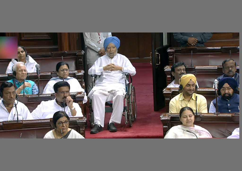 Former Indian prime minister Manmohan Singh, 90, attends a discussion in the parliament in New Delhi in a wheelchair