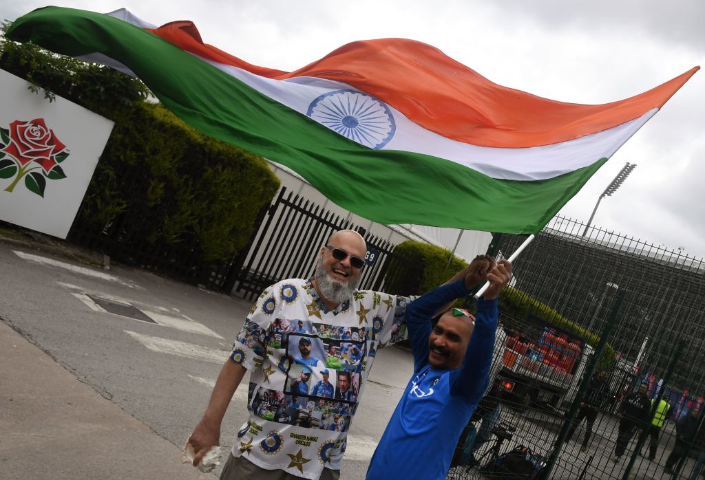 Indian cricket fan Sudir Gautam (R) and Pakistani cricket fan Mohammad Bashir during World Cup 2019