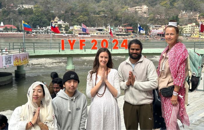 Participants of the International Yoga Festival 2024 at Parmarth Niketan Ashram in the north Indian state of Uttarakhand