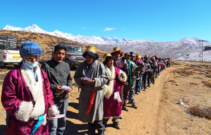 Voters queue up for casting ballots in Tashigang in the Himalayan state of Himachal Pradesh